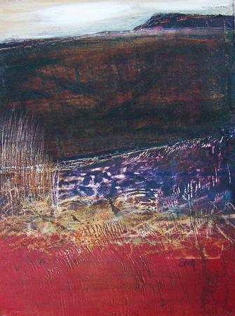 a field by the sea