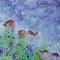 Bluebells and spurge appear to touch the ocean