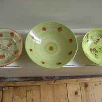 a selection of green bowls