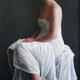 Seated in white drapes