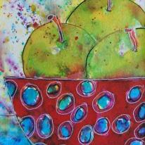 Green Apples in a Red and Blue Spotted Bowl