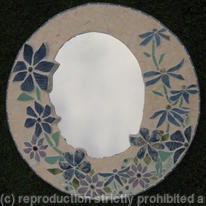 Mirror made with Lucy's ceramics