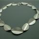Folded leaf necklace