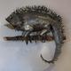 Iguana | | 85 x 75cm | Recycled Tin-Cans/ Tree Branch Iguana