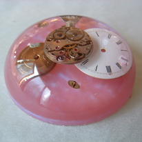 Paperweight with timepiece