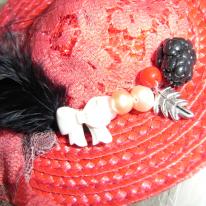 mini red berries boater close up