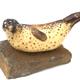 Seal Basking | (sold) | | Burnished Clay, Smoke-Fired and waxed on stone base Seal Basking