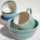 stacked bowls and mug | | | thrown semi porcelain stoneware stacked bowls and mug